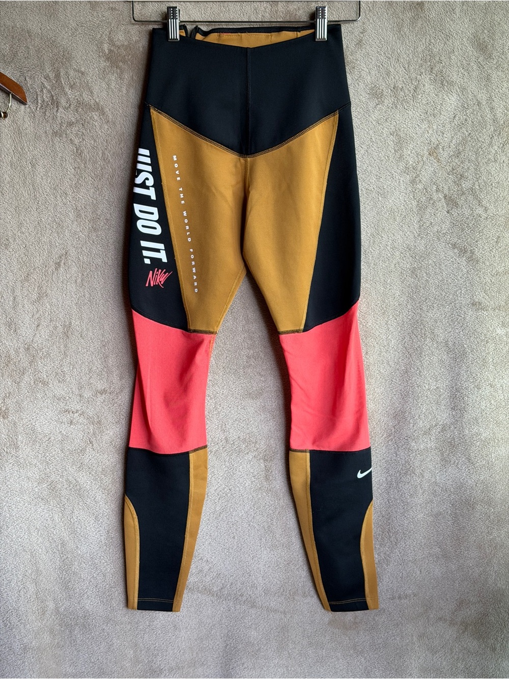 Nike women’s Colorblock Leggings in Black, mustard yellow , Coral